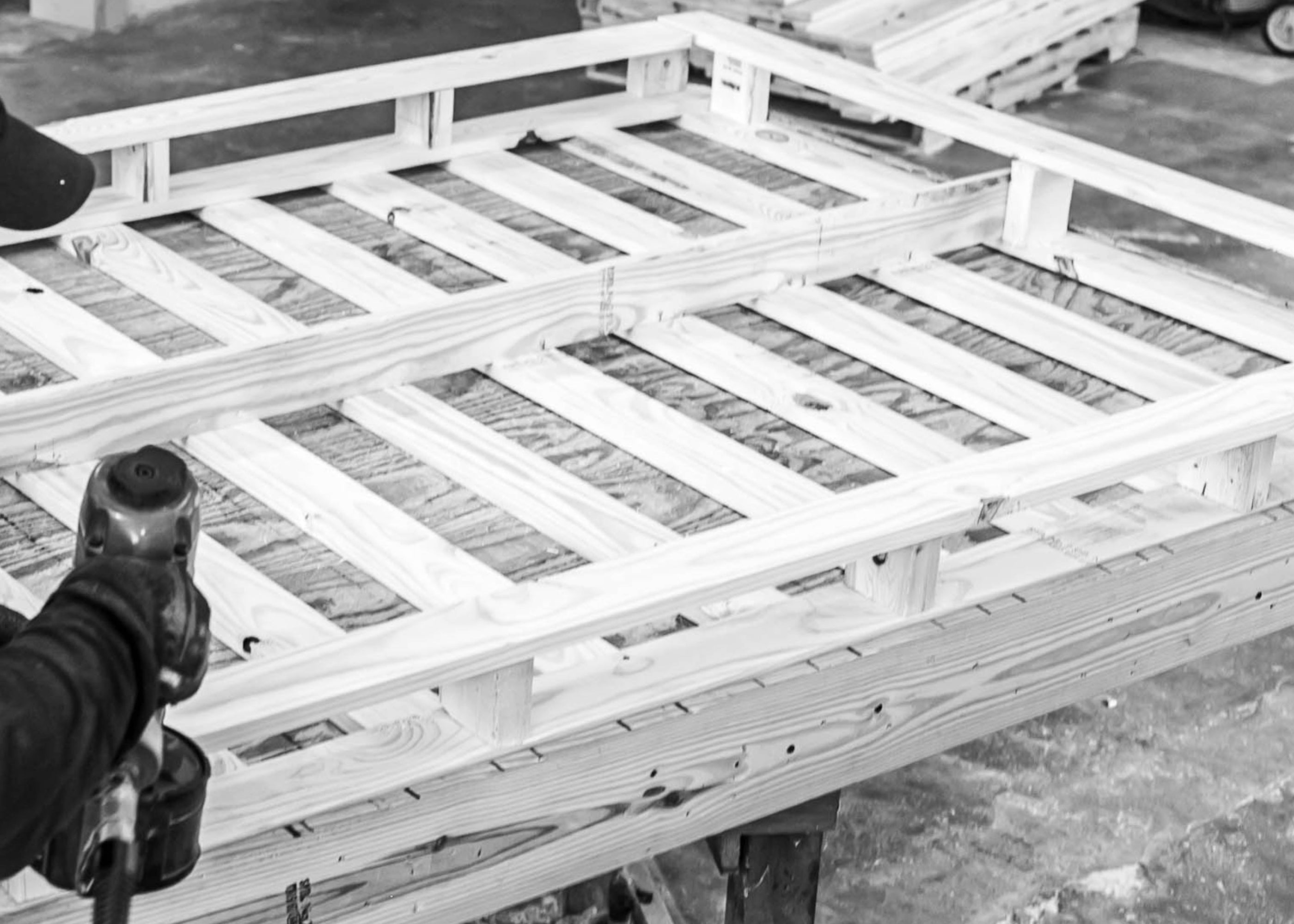 Man building a boxspring for a mattress