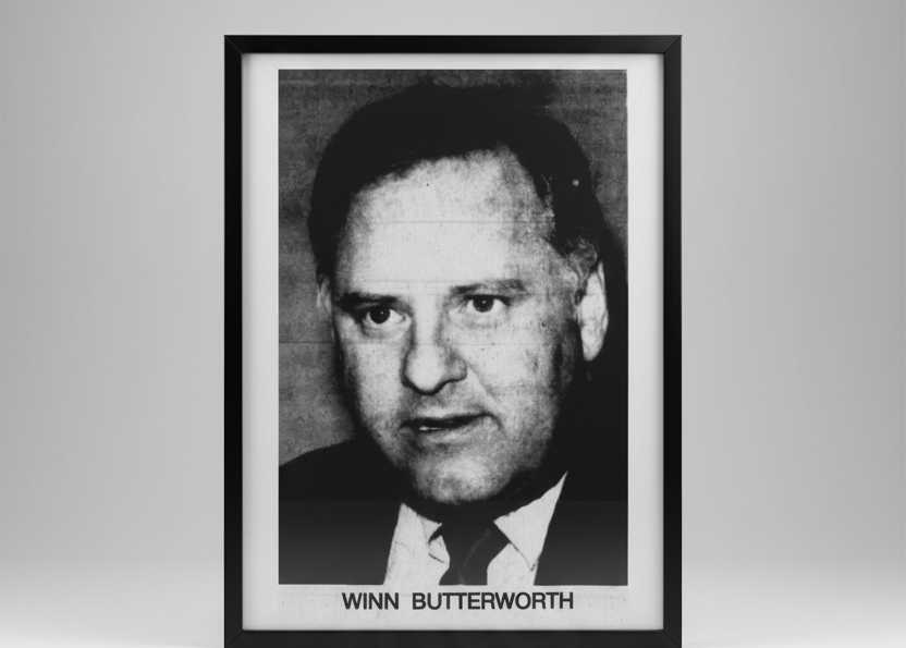 Black and white portrait of a man with text 'Winn Butterworth' at the bottom.
