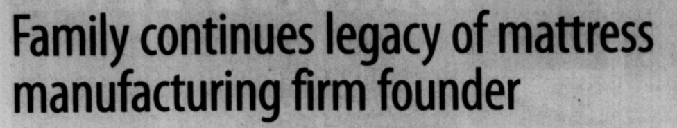 Image of newspaper article title showing text.