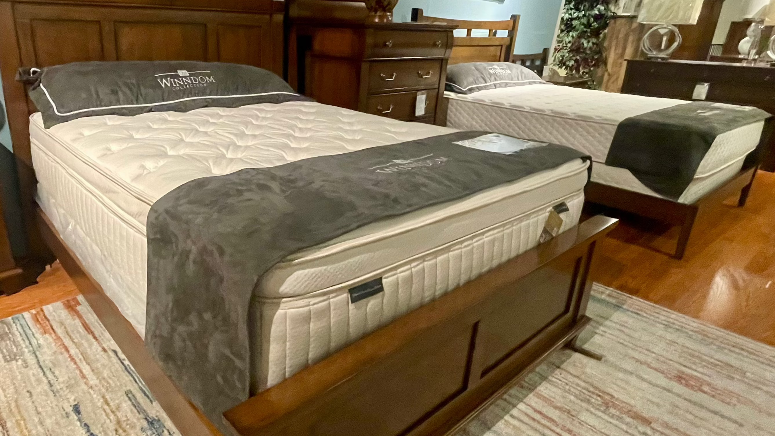 Winndom Mattress, Winndom boxspring, Foam mattress on display in furniture store showroom. 